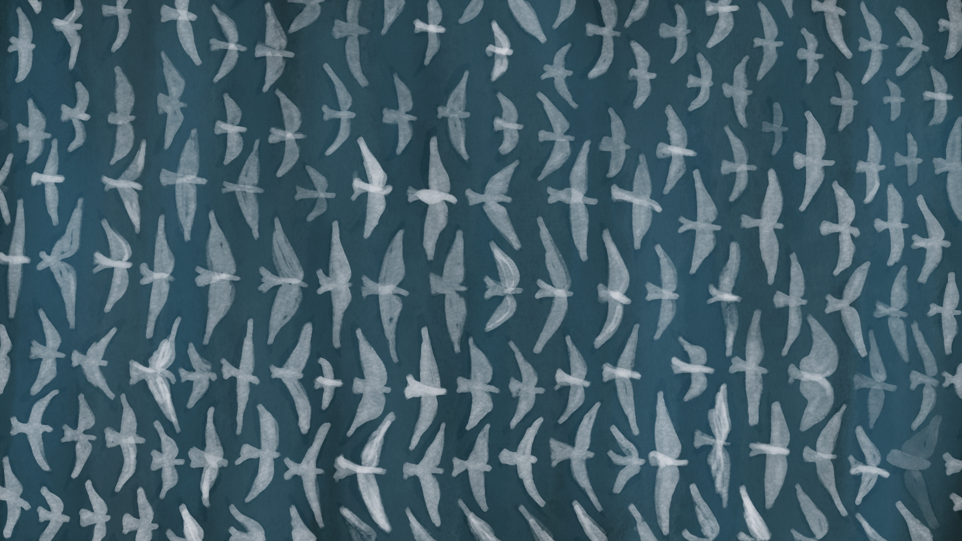 A great flock of birds rising into the sky together